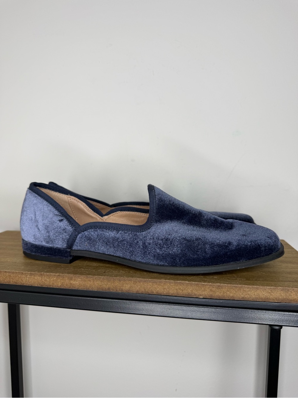 Chelsea & Violet slip-on flats feature a luxurious navy blue velvet finish